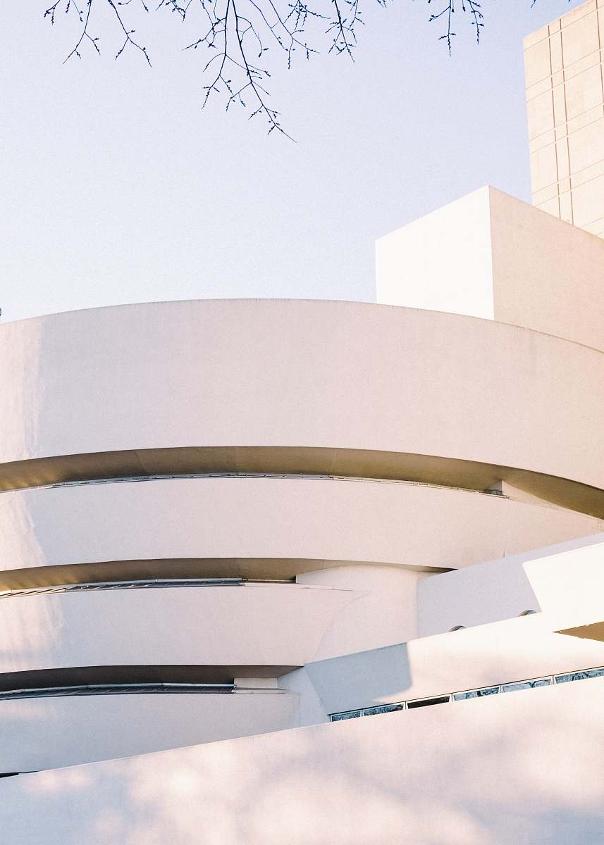 solomon r. guggenheim museum white concrete building during daytime new york